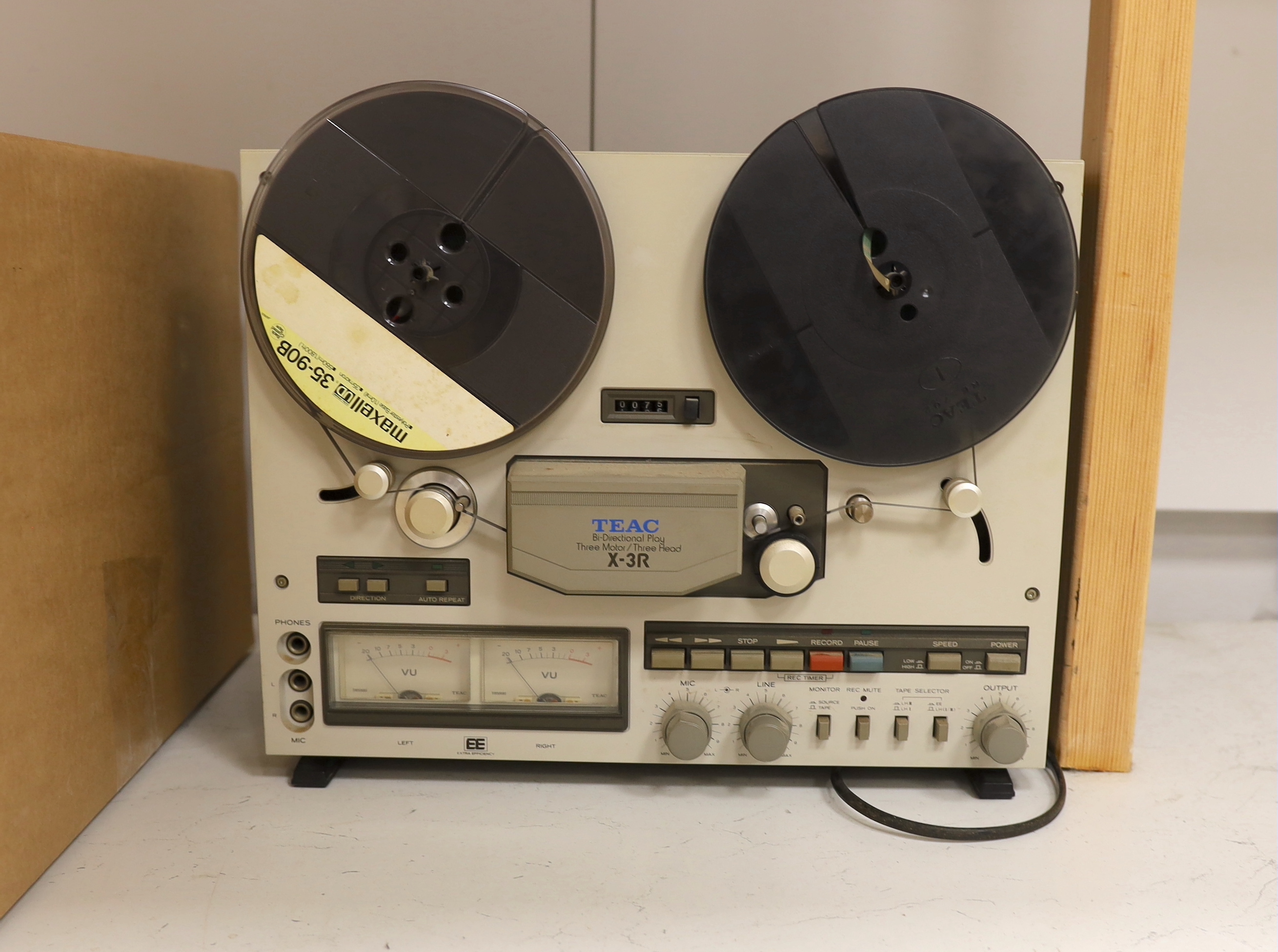 A TEAC X-3R reel to reel player, together with a collection of cased reels